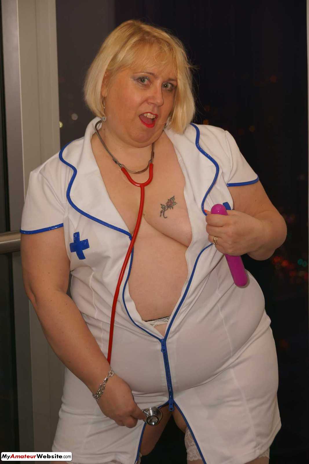 LexieCummings - Nurse Lexie flashes at the window